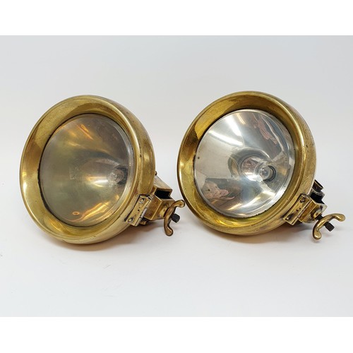 90 - A pair of early 20th century C A Vanderdevell brass electric headlamps, 16 cm diameter (2)