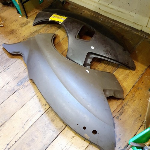 93 - Two genuine Jaguar new old stock offside rear, and nearside rear wing panels (2)