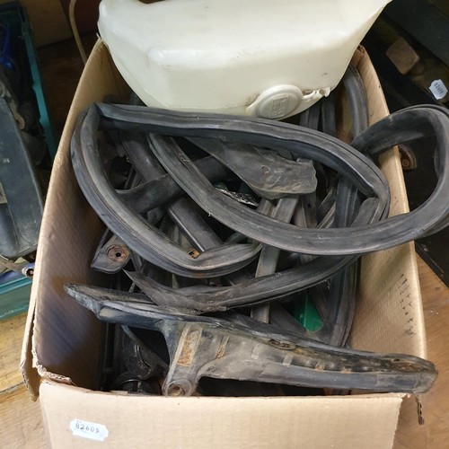 96 - A car trunk, trolley jacks, various car parts, including Toyota MR2, a steering wheel, and other ite... 