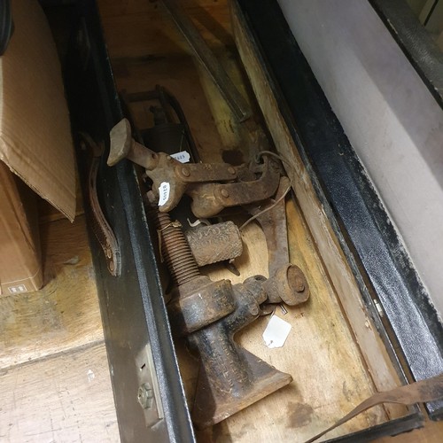 96 - A car trunk, trolley jacks, various car parts, including Toyota MR2, a steering wheel, and other ite... 