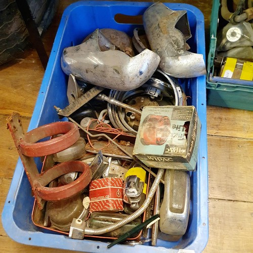 96 - A car trunk, trolley jacks, various car parts, including Toyota MR2, a steering wheel, and other ite... 