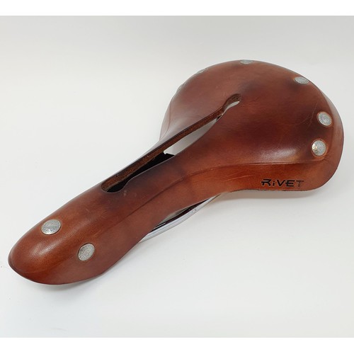 113 - A Rivet brown leather luxury bicycle saddle, 28 cm

Provenance: Sold on behalf of Tenovus Cancer Car... 