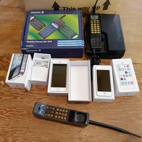 279 - A Panasonic E-TACS carphone, an Eriksson GA318, boxed, and assorted other 80s, 90s and early 2000s p... 