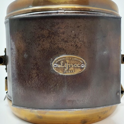 133 - A pair of early 20th century Lynx Paris brass headlamps, bodies only, one lacks its lens, 34 cm high... 