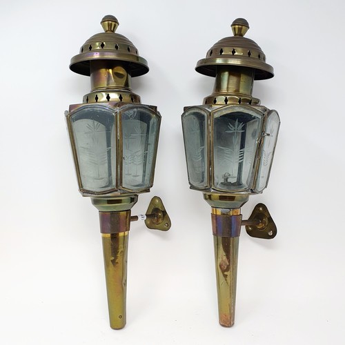 136 - A pair of early 20th century brass coaching lamps, 47 cm high (2)