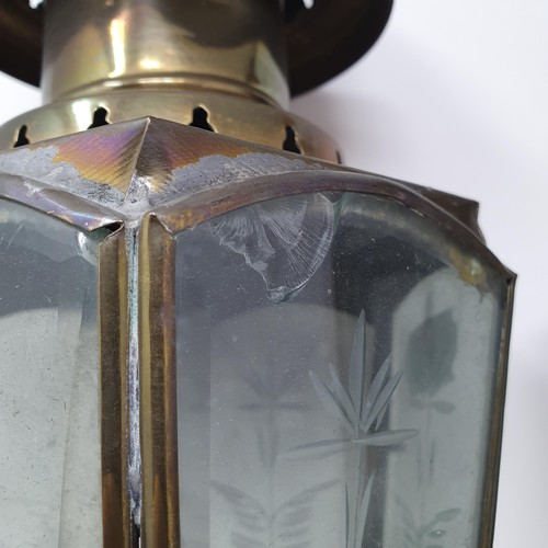 136 - A pair of early 20th century brass coaching lamps, 47 cm high (2)