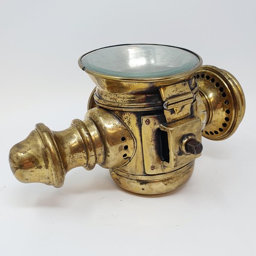 141 - An early 20th century Phare SantyGan brass oil sidelamp, lens cracked, 26 cm high