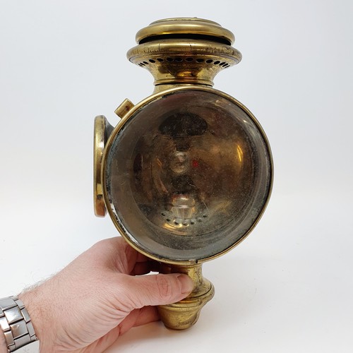 141 - An early 20th century Phare SantyGan brass oil sidelamp, lens cracked, 26 cm high