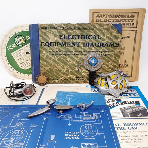 123 - Assorted vehicle related electrical ephemera, an RAC Associate badge, and other items