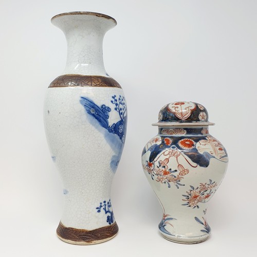 323 - A Chinese crackle glaze vase, of inverted baluster form, decorated figures and foliage, 35.5 cm high... 