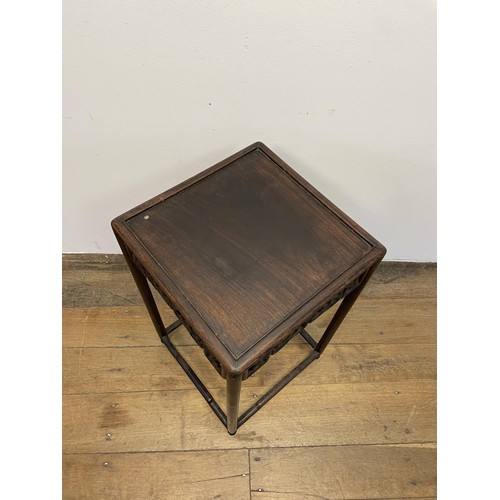 368 - A Chinese hardwood stand, with a pierced frieze, 60 cm high, 34 cm wide