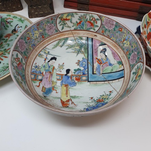 348 - A Chinese bowl, decorated figures, 21 cm diameter, a pair of Chinese silk mounted shoes and other it... 