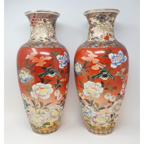 361 - A pair of Japanese vases, 50 cm high, a pair of carved green stone birds, three teapots, a part tea ... 