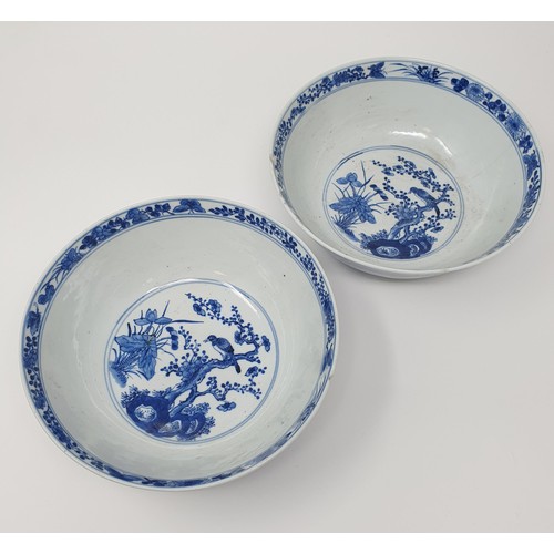 356 - A pair of Chinese porcelain bowls, decorated dragons and foliage in underglaze blue, four character ... 