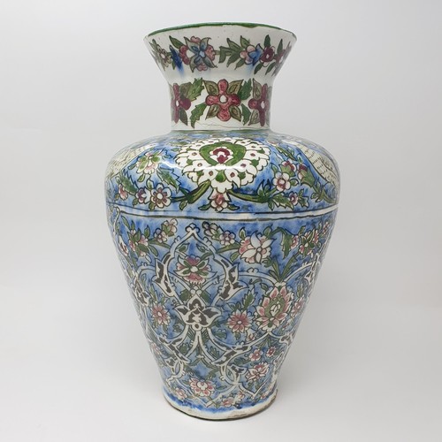 355 - A Iznik pottery vase, decorated birds, 35 cm high