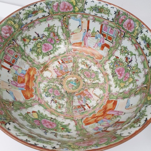 352 - A graduated set of three Cantonese famille rose bowls, 20th century, the largest 41 cm diameter (3)