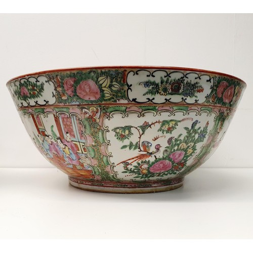 352 - A graduated set of three Cantonese famille rose bowls, 20th century, the largest 41 cm diameter (3)