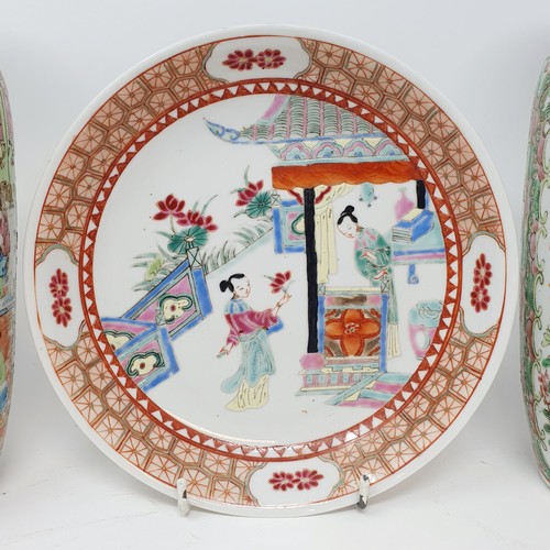 327 - A Chinese famille rose shallow dish, decorated figures, chipped, 18.5 cm diameter, and a pair of Can... 