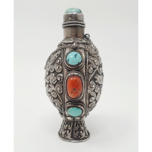 309 - An Eastern silver and hardstone snuff bottle, 10 cm high