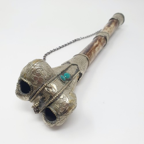 311 - A Tibetan Kangling bone pipe, with white coloured metal mounts, 31 cm