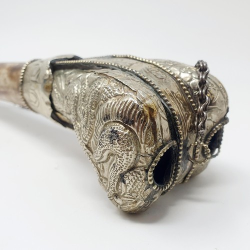 311 - A Tibetan Kangling bone pipe, with white coloured metal mounts, 31 cm