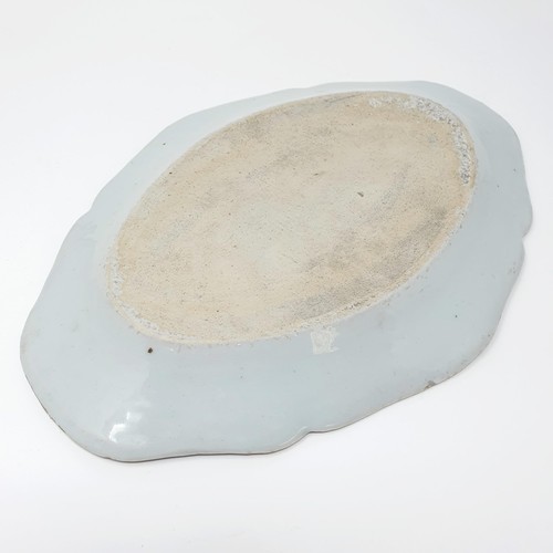 319 - A Chinese underglazed blue and white oval dish, 31 cm wide