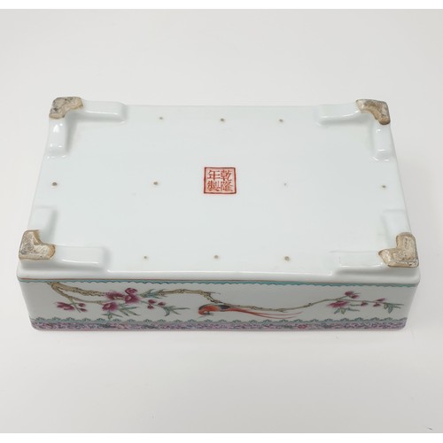 324 - A Chinese rectangular planter, decorated bird and flowers, character mark to base, 24 cm wide