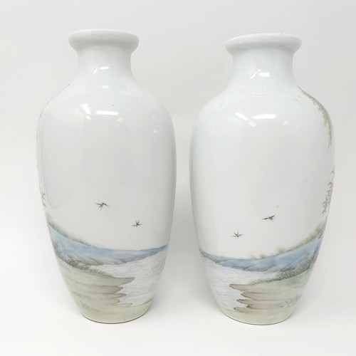 328 - A pair of Chinese vases, decorated figures, character mark to base, 14 cm high (2)