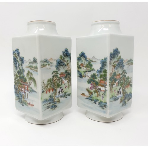 329 - A pair of Chinese cong vases, decorated landscapes, character marks to base, 18 cm high