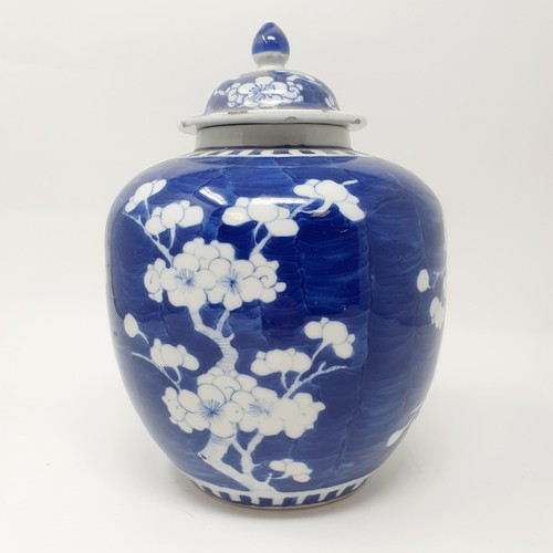 359 - A Chinese underglazed blue and white ginger jar and cover, decorated blossoms, four character mark t... 