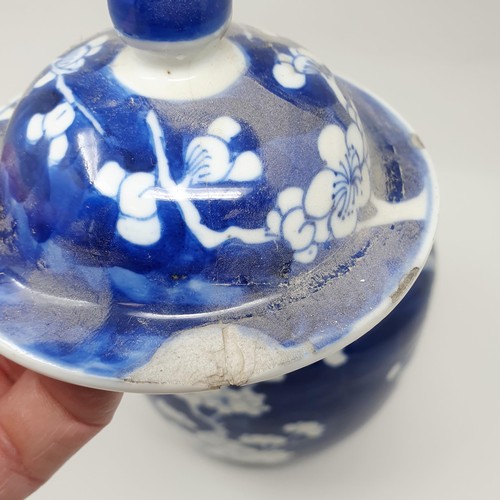 359 - A Chinese underglazed blue and white ginger jar and cover, decorated blossoms, four character mark t... 