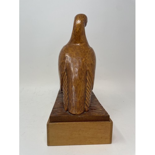 503 - A carved wood figure of a pigeon, inscribed 'Meinem Freind John Tucker, August 1969' on the base, 28... 