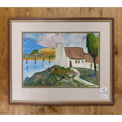 709 - Robert Dunleavey (Irish), a landscape with a church, oil on board, signed, 29 x 39 cm