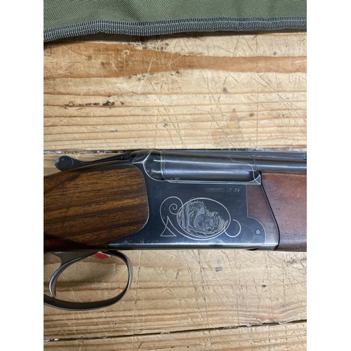 541 - A Baikal 12 bore over and under shotgun, and a slip case (2)
Note: This can only be released to the ... 