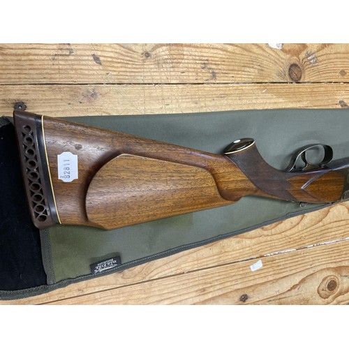 541 - A Baikal 12 bore over and under shotgun, and a slip case (2)
Note: This can only be released to the ... 