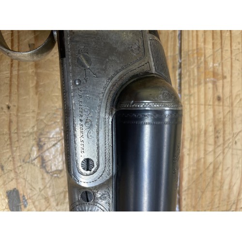 542 - A Sauer 12 bore side by side shotgun, and a slip case (2)
Note: This can only be released to the hol... 