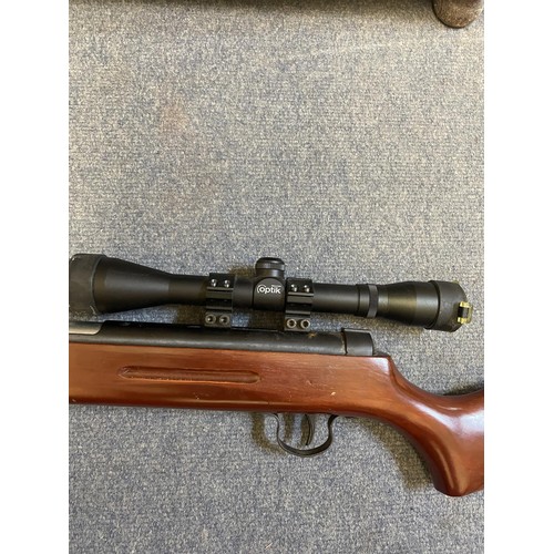 557 - A .22 air rifle, with a Richter Optik sight