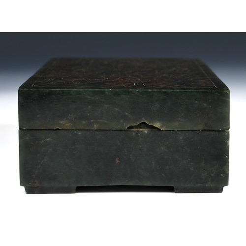 300 - A Chinese spinach-green jade box and cover, of rectangular form, the cover incised with a floral des... 