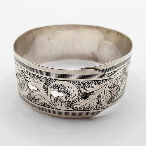 122 - A silver bangle, by Charles Horner, 29.9 g