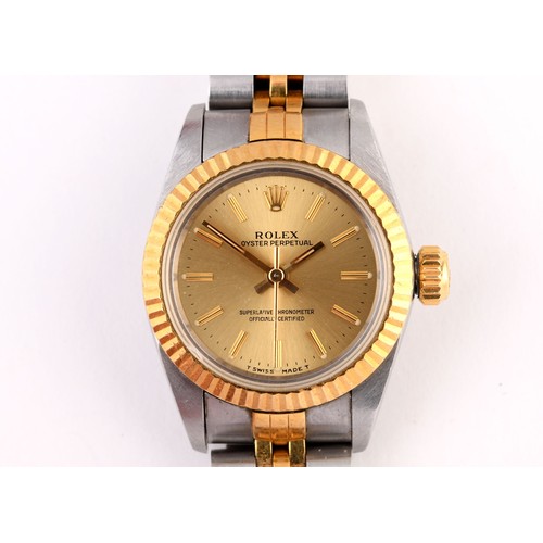 467 - A ladies stainless steel and gold Rolex Oyster Perpetual wristwatch, with two spare links, boxes and... 