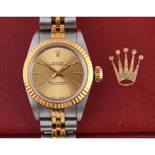 467 - A ladies stainless steel and gold Rolex Oyster Perpetual wristwatch, with two spare links, boxes and... 