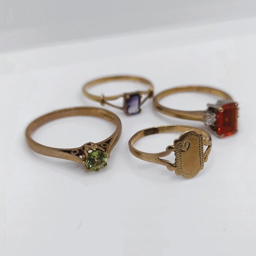 101 - A 9ct gold signet ring, and three other gem set rings (4) Provenance: From a large single owner coll... 