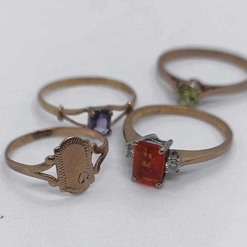 101 - A 9ct gold signet ring, and three other gem set rings (4) Provenance: From a large single owner coll... 