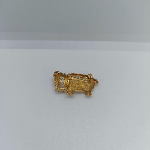 105 - A yellow metal and white stone brooch, in the form of a hippo  Provenance: From a large single owner... 