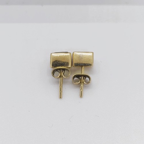 111 - A pair of 18ct gold and green stone stud earrings  Provenance: From a large single owner collection ... 