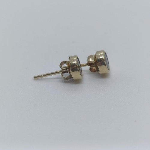 112 - A pair of 14ct gold stud earrings  
Provenance: From a large single owner collection of jewellery co... 