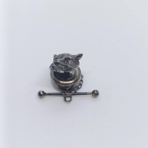 119 - A silver coloured metal tie pin, in the form of a fox