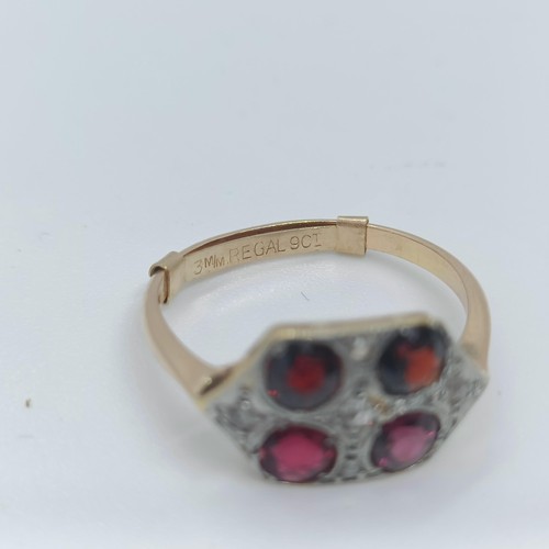 120 - A 9ct gold diamond and garnet four stone ring, ring size O 1/2