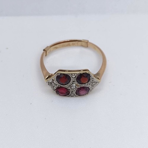 120 - A 9ct gold diamond and garnet four stone ring, ring size O 1/2