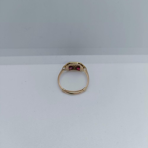 120 - A 9ct gold diamond and garnet four stone ring, ring size O 1/2